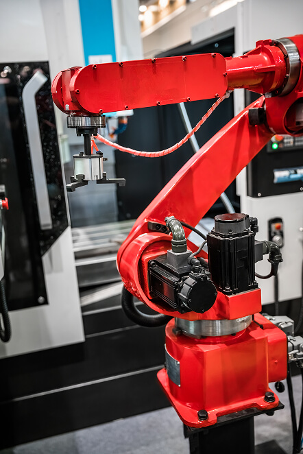 Industrial robotic arm for CNC machine integration